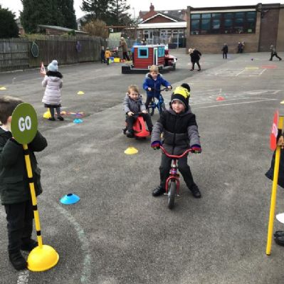 Ash and Blossom class enjoyed celebrating Road Safety Awareness Day by learning how to cross a road safely through role play.