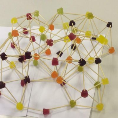 In our second science club meeting, the children were challenged to build a dome that would hold a hard backed book.